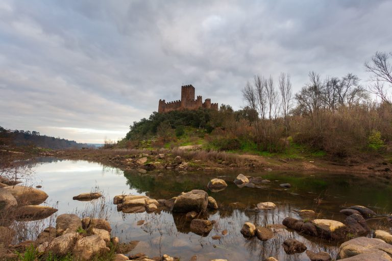 Beautiful shot of the Castle Almourol, and the river Tagus in Portugal
